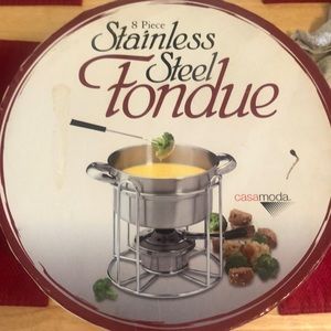 8 piece stainless steel fondue set brand new ! Never been opened